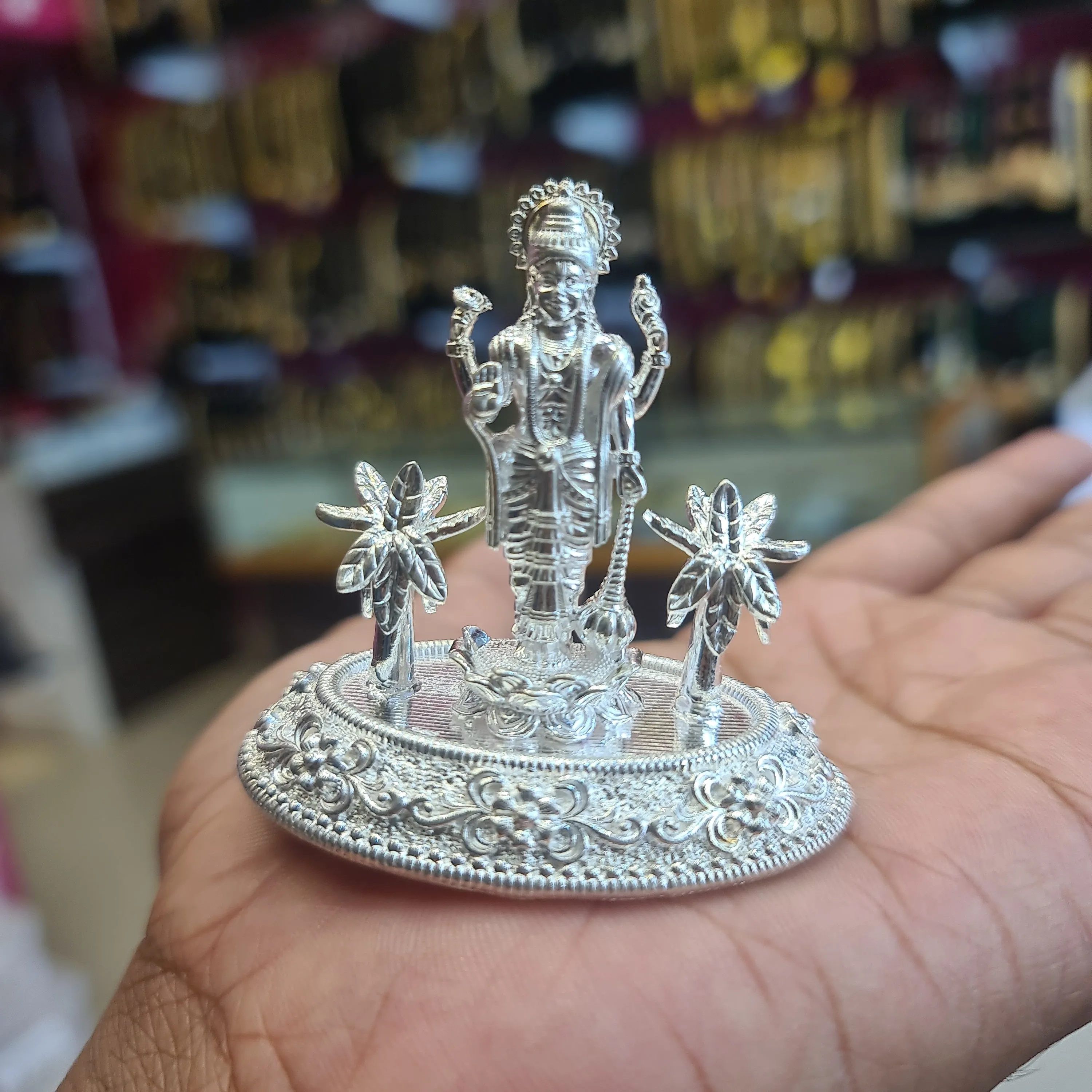 "Radiant Reverence: The Graceful Majesty of a Lord Vishnu Silver Idol"